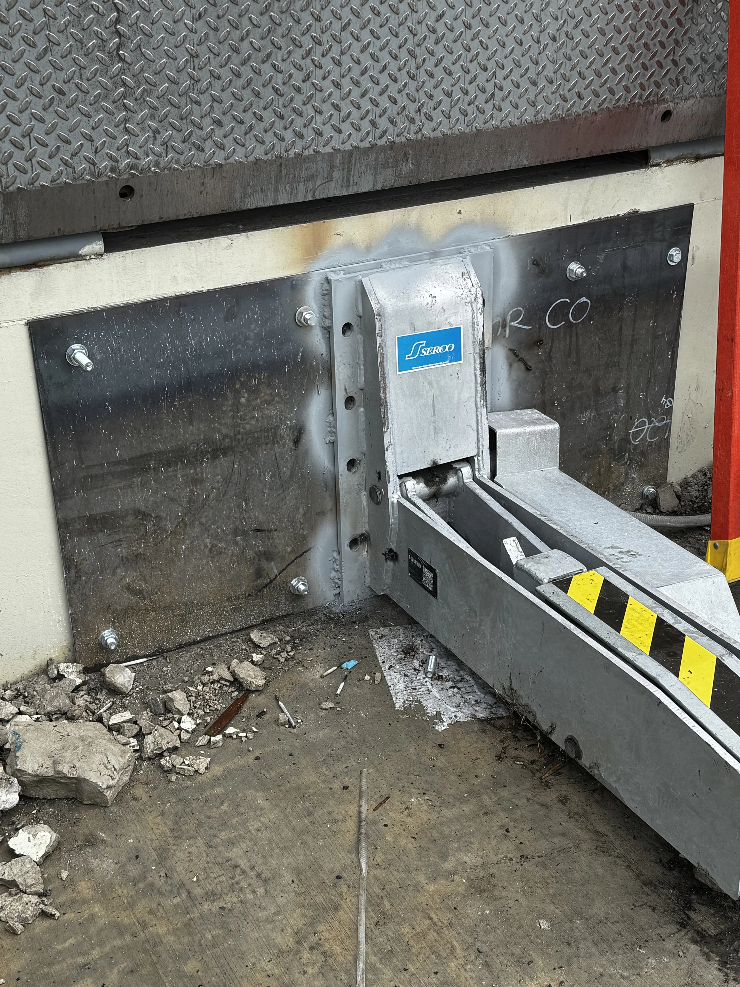 Serco truck restraint installation at loading dock