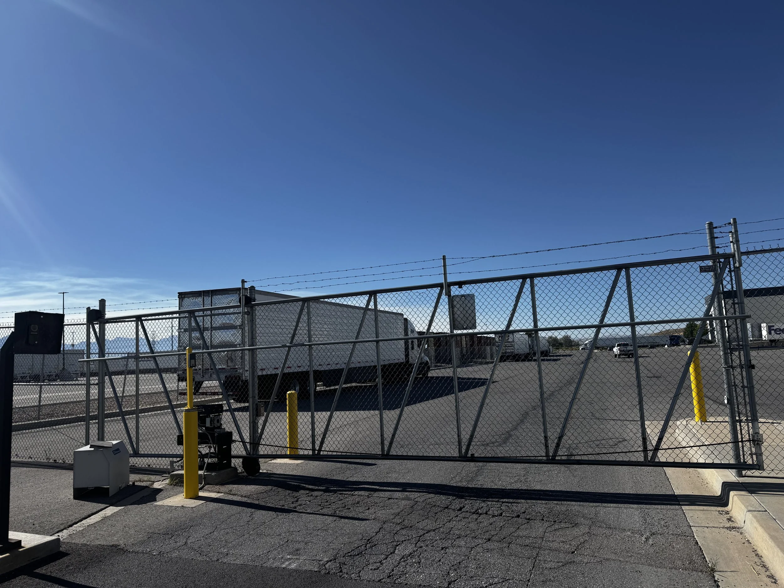 Security gate with operator at commercial facility