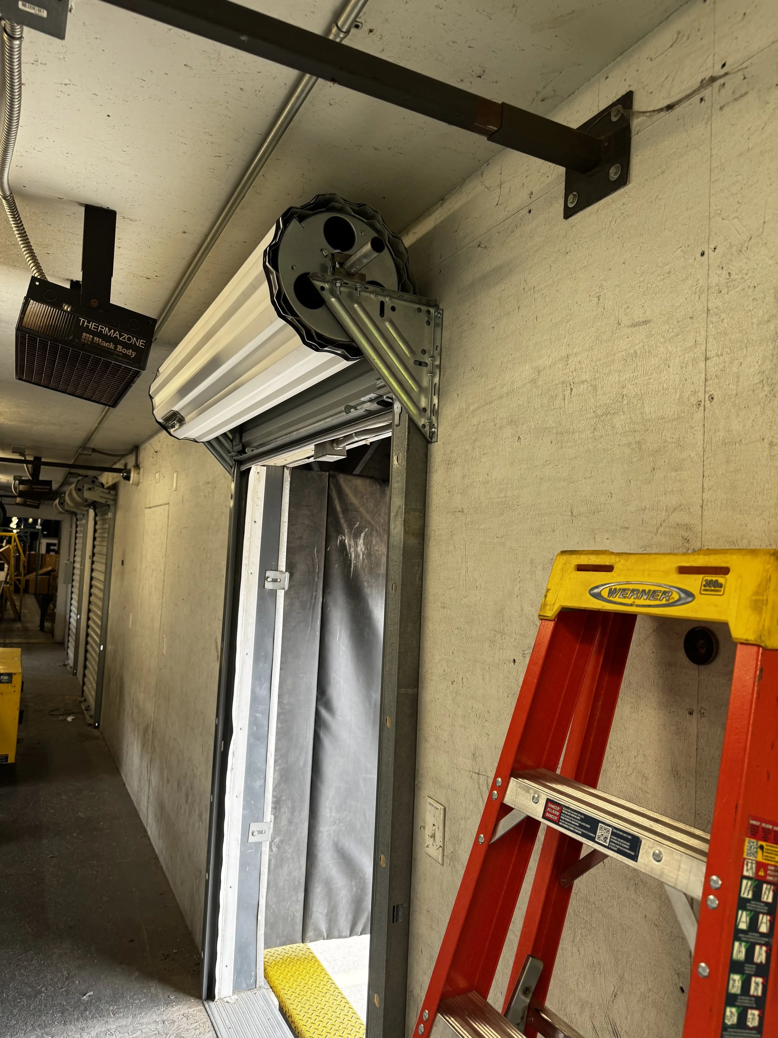 Dock leveler and dock seal installation