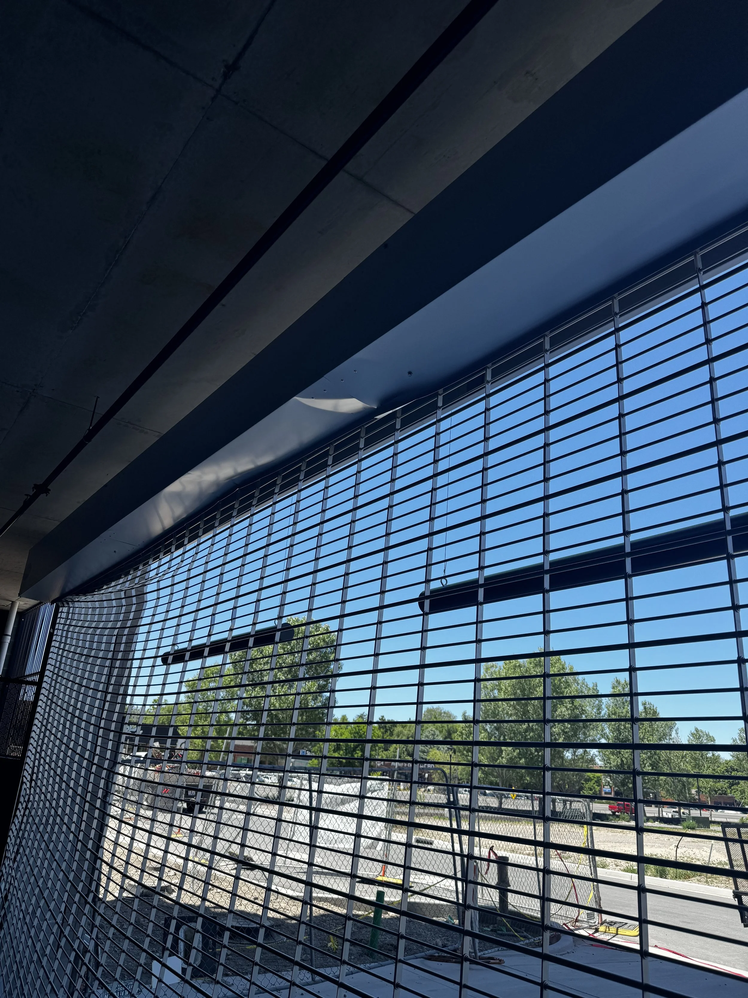 Loading dock with leveler and dock seal